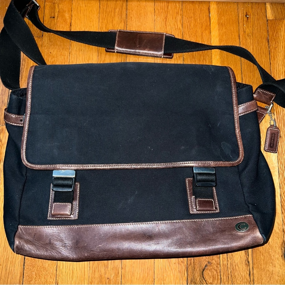 Coach black canvas brown leather messenger, silver hardware. Excellent condition